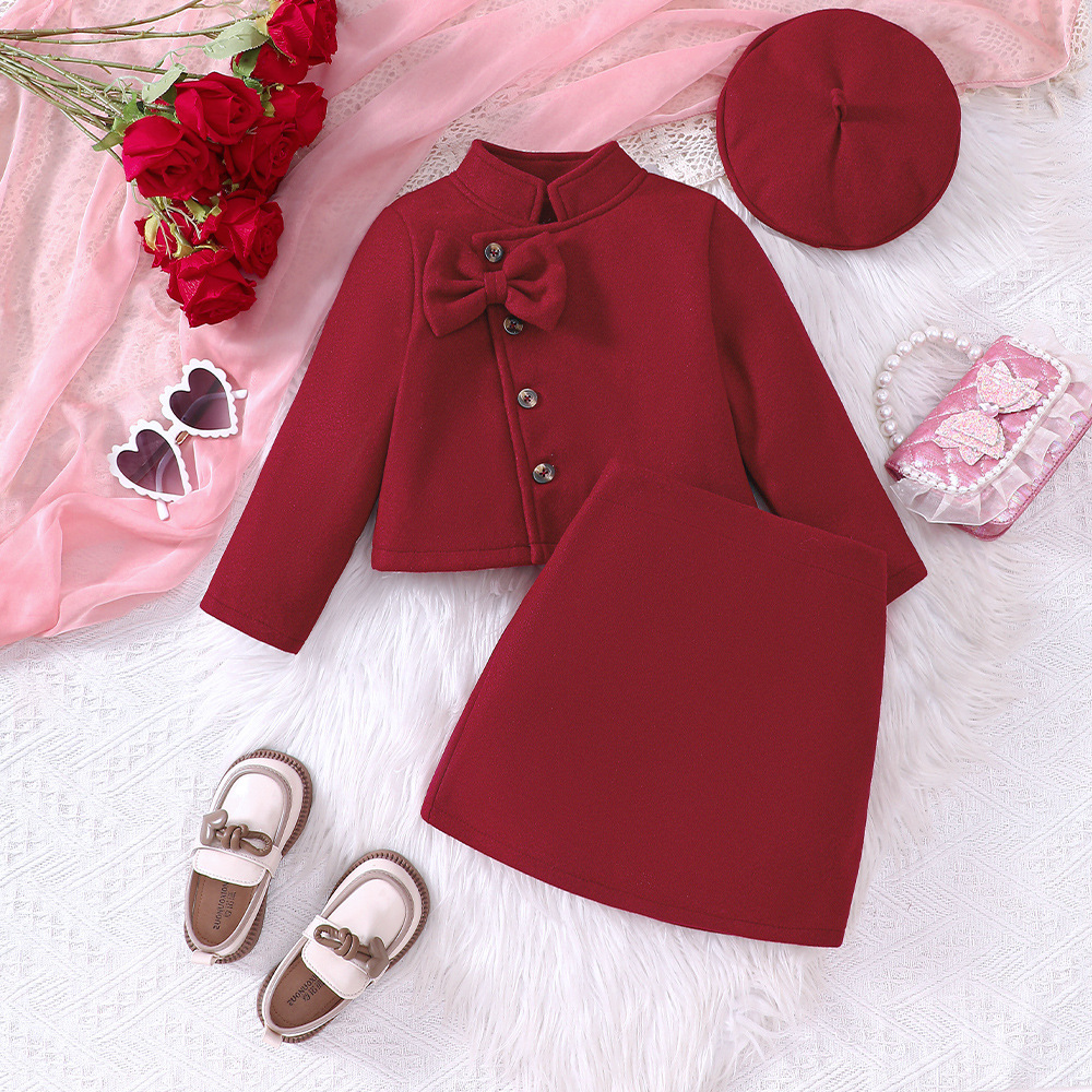 ea922618-d0ed-4a97-a1db-7ca7fd1c769c.jpg Girls' Autumn And Winter New Woolen Bow Top Skirt Outfit - الصورة 1